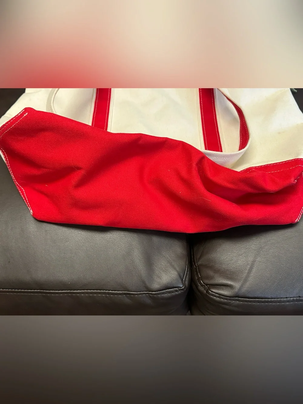 Cream Canvas Tote with Red Trim and Decorative Charm